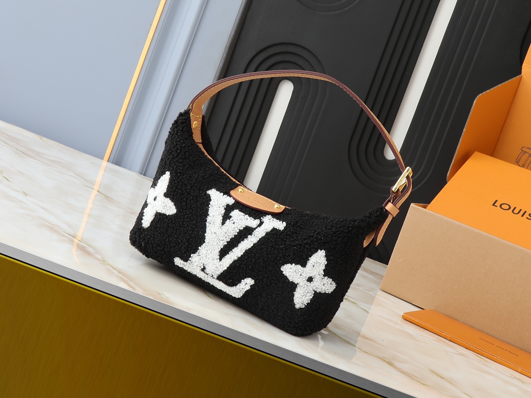 LV Classic Handbag Monogram Empreinte Model M12174 Padlock Detail